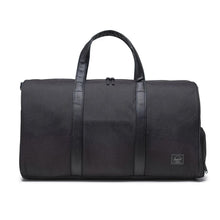 Load image into Gallery viewer, Front view of the black duffle bag with black vegan leather grab handles.