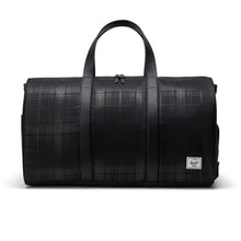 Load image into Gallery viewer, Front view of the Plaid Embossed Novel Black Duffle bag.