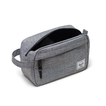 Load image into Gallery viewer, Angled view of the gray raven crosshatch travel kit bag. The main compartment is unzipped.