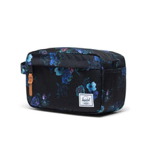 Load image into Gallery viewer, Angled front view of the black travel kit with flower print.