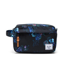 Load image into Gallery viewer, Front panel view of the black travel kit with flower print.