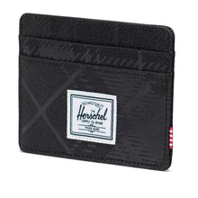 Load image into Gallery viewer, Angled view of the card holder in plaid embossed black.