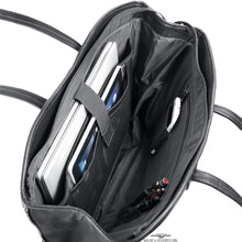 Load image into Gallery viewer, Angled interior view of the black leather tote bag. A laptop, tablet, cellphone, and three pens are organized in the dedicated pockets.