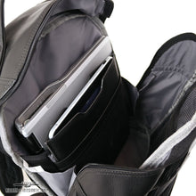 Load image into Gallery viewer, Interior view of the black backpack's main compartment. A laptop and tablet are tucked inside the dedicated pockets.