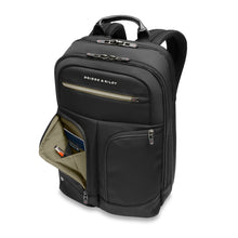 Load image into Gallery viewer, Briggs & Riley HTA Medium Slim Expandable Backpack - Black
Image of Left Facing Front Panel View. The two front zip pockets both have nylon gussets and are ideal for quick access travel accessories.
Dimensions: 16 in x 10.5 in x 6 in
Weight: 2.15 lbs.