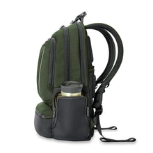 Load image into Gallery viewer, Briggs & Riley HTA Large Cargo Backpack - Hunter
Image of side panel view showing side panel pocket. Ideal for a travel thermos or water bottle.
Dimensions: 18.5" x 14" x 8"
Weight: 2.5 lbs.