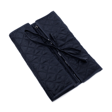 Load image into Gallery viewer, Angled view of the black jewelry roll. it can also be used to store your pens.