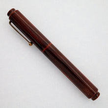 Load image into Gallery viewer, Side view of the fountain pen. Set on a white background.