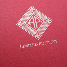 Load image into Gallery viewer, Close up to the AP Limited Editions logo set on the red presentation box. There is a small mark under the letter L.