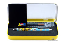 Load image into Gallery viewer, The yellow presentation box is shown opened with the pen in its slot, along with a refill, and a small folded booklet.