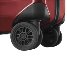 Load image into Gallery viewer, Close up to a wheel on the red suitcase.