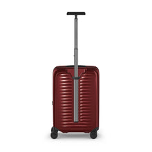Load image into Gallery viewer, Back panel view of the red suitcase with the handle extended.