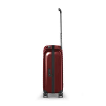 Load image into Gallery viewer, Side panel view of the red suitcase with the handle extended.