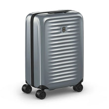 Load image into Gallery viewer, Angled front panel view of the silver suitcase.