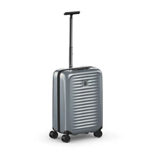 Load image into Gallery viewer, Angled front panel view of the silver suitcase with the telescopic handle extended.