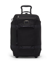 Load image into Gallery viewer, Front Panel View of the suitcase with the telescopic handle partly extended.