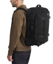 Load image into Gallery viewer, Alpha Bravo 2 Wheeled Duffel Backpack Carry-On - Backpack feature with model