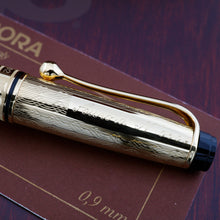 Load image into Gallery viewer, Close up to the engraved side of the mechanical pencil. It reads "Aurora N. 0609"