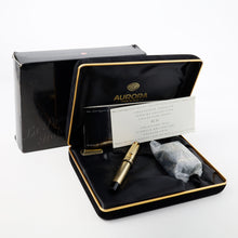 Load image into Gallery viewer, Arrangement of the fountain pen on the presentation box with its contents: The outer sleeve, documents, and ink bottle.
