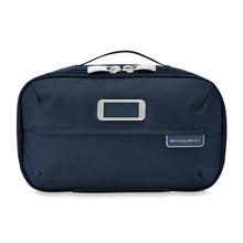 Load image into Gallery viewer, Briggs & Riley Baseline Expandable Essentials Kit - Navy
Image of Front Panel View
Height	Width	Depth	Weight
US	6 in.	11 in.	4.5 in.	.8 lbs.
EU	15.2 cm	27.9 cm	11.4 cm	0.4 kg