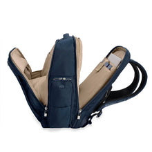 Load image into Gallery viewer, Briggs & Riley Baseline Traveler Backpack - Navy
Image of Side Angled View showing the three main compartments (front, middle and back). The perfect business travel companion.
Height Width Depth Weight
US 18 in. 12 in. 8.8 in. 3.3 lbs.
EU 45.7 cm 30.5 cm 22.4 cm 1.5 kg