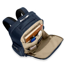 Load image into Gallery viewer, Briggs & Riley Baseline Traveler Backpack - Navy
Angled View of Front Business Organizer Compartment. Ideal for sunglasses, smart phone, chargers, cables, notepad, etc.
Height Width Depth Weight
US 18 in. 12 in. 8.8 in. 3.3 lbs.
EU 45.7 cm 30.5 cm 22.4 cm 1.5 kg