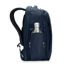 Load image into Gallery viewer, Briggs & Riley Baseline Traveler Backpack - Navy
Image of left side panel with hydration pocket for water bottle or travel thermos
Height Width Depth Weight
US 18 in. 12 in. 8.8 in. 3.3 lbs.
EU 45.7 cm 30.5 cm 22.4 cm 1.5 kg