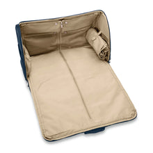 Load image into Gallery viewer, Briggs & Riley Baseline Garment Bag Duffle - Navy
Image of Interior Garment Suiter compartment with protective zip closure to protect your garments
Height	Width	Depth	Weight
US	12.5 in.	22 in.	9 in.	4.2 lbs.
EU	31.8 cm	55.9 cm	22.9 cm	2 kg