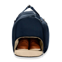 Load image into Gallery viewer, Briggs & Riley Baseline Garment Bag Duffle - Navy
Image of shoe tunnel on side panel of garment duffle
Height	Width	Depth	Weight
US	12.5 in.	22 in.	9 in.	4.2 lbs.
EU	31.8 cm	55.9 cm	22.9 cm	2 kg