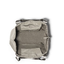 Load image into Gallery viewer, Top view of the sterling bag with the zipper open. Set on a white background.