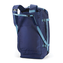 Load image into Gallery viewer, Vertical bottom panel view of the blue duffle backpack with the shoulder straps extended.