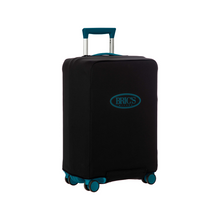 Load image into Gallery viewer, Angled view of the suitcase with the black cover placed on it. The Bric's logo in the matching sea green color is at the front.
