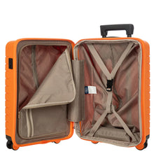 Load image into Gallery viewer, Inside view of the suitcase. The lid's side features a zippered compartment, shown partly opened. The back side features a set of straps to keep items in place.