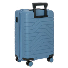 Load image into Gallery viewer, Angled back view of the suitcase on a white background. The telescopic handle is partly pulled up.
