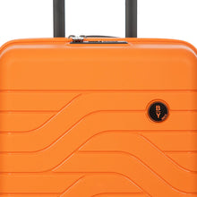 Load image into Gallery viewer, Close up to the front top-half of the suitcase on a white background. A small B|Y Bric's logo is featured on the top right.