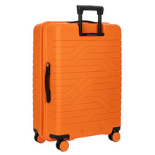 Load image into Gallery viewer, Angled back view of the suitcase on a white background.