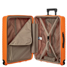 Load image into Gallery viewer, Inside view of the suitcase on a white background. The lid's zipper compartment is partly opened.