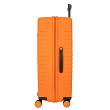 Load image into Gallery viewer, Side view of the orange expandable suitcase on a white background. This side features a handle.