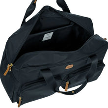 Load image into Gallery viewer, Angled top view of the duffle with the main compartment opened.