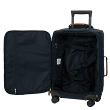 Load image into Gallery viewer, Opened view of the suitcase on a white background. The lid has a zipper compartment, and the main compartment features some straps to keep contents in place.