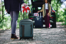 Load image into Gallery viewer, Briggs & Riley ZDX 22" Domestic Carry-On Expandable Spinner - Ocean Blue
Shown with male model
Dimensions:  22 x 14 x 9"
Weight:           7.4 lbs.