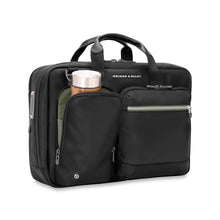 Load image into Gallery viewer, Briggs & Riley HTA Slim Expandable Brief - Black
Front Angled View of Brief showing that front smaller pocket will accommodate a water bottle or travel thermos.
Height	Width	Depth	Weight
US	15.75"	11"	6"	2.55 lbs.
EU	40 cm	27.9 cm	15.24 cm	1.16 kg