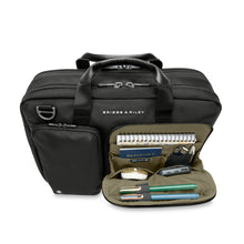 Load image into Gallery viewer, Briggs & Riley HTA Slim Expandable Brief - Black
Front Panel View of Brief with one small and one large pocket.  Large Pocket shown unzipped with organization for passport, smart phone, pens, cables, chargers, travel mouse, tablet, etc.
Height	Width	Depth	Weight
US	15.75"	11"	6"	2.55 lbs.
EU	40 cm	27.9 cm	15.24 cm	1.16 kg