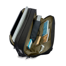 Load image into Gallery viewer, Briggs & Riley HTA Slim Expandable Brief - Black
Side Angled View, showing both front pocket with room for note tablets, charger cables, travel umbrella, portable charger, and all your typical travel business accessories.  Back panel offers protection for both your Laptop and Tablet.
Height	Width	Depth	Weight
US	15.75"	11"	6"	2.55 lbs.
EU	40 cm	27.9 cm	15.24 cm	1.16 kg