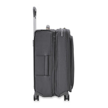 Load image into Gallery viewer, Side view of the suitcase with the expandable feature expanded.