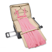 Load image into Gallery viewer, The Top Lid Suiter Compartment shown open and with a dress in place.