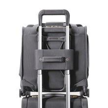 Load image into Gallery viewer, Back panel view of the steel gray cabin spinner suitcase. The attachment Feature is slid into a suitcase's telescopic handle.