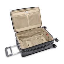 Load image into Gallery viewer, The suitcase laid on its back with the main compartment opened.