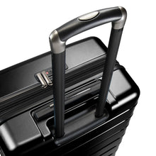 Load image into Gallery viewer, Angled top view of the black hard shell suitcase. The telescopic handle is extended.