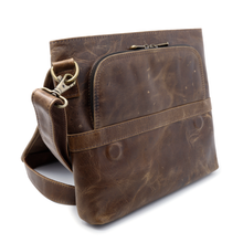 Load image into Gallery viewer, DayTrekr Distressed Leather Slim Crossbody Tablet Messenger - Brown
Image of Crossbody Front Panel, featuring U-Shaped Pocket under the flap. Also features convenient magnetic closure on front panel.
Dimensions: 11.5 x 10 x 1"